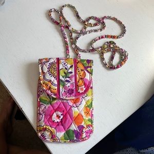 Phone holder with pockets